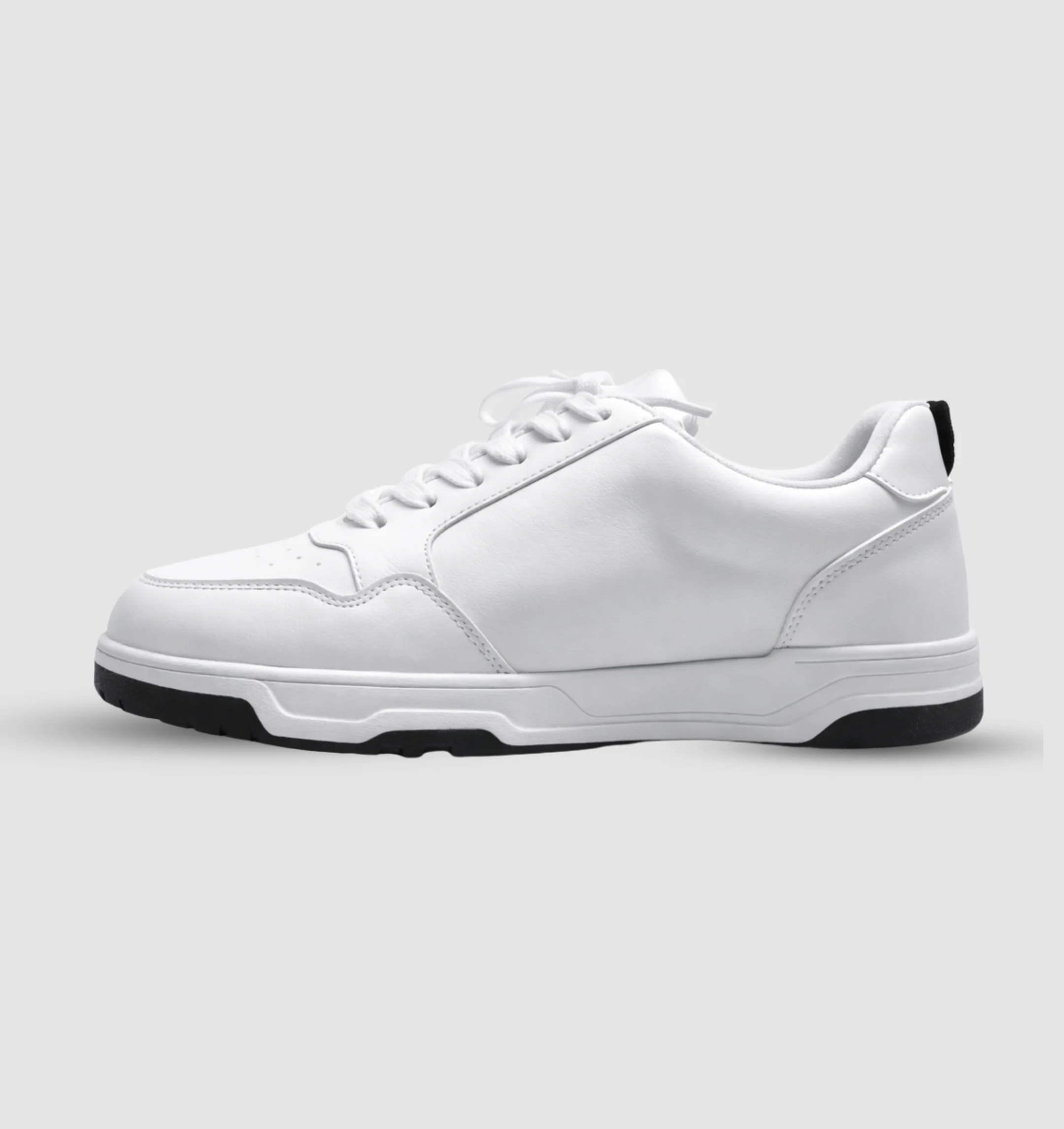Side profile of hidden height shoes showing sleek design and subtle height increase
